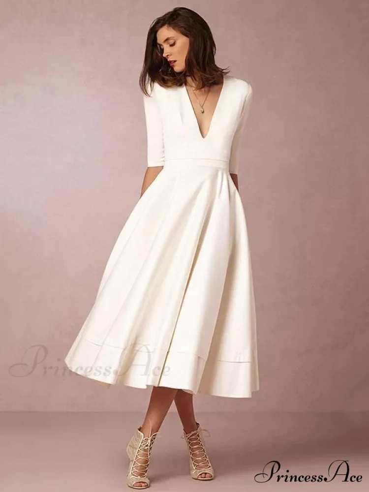 Elegant White V-neck Evening Dress with Half Sleeves